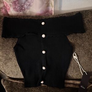 Stylish Off-Shoulder Black Sweater with Pearl Button Detail